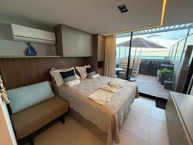 Cobertura com piscina privativa e vista mar
